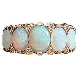 An Opal Diamond And Yellow Gold Ring
