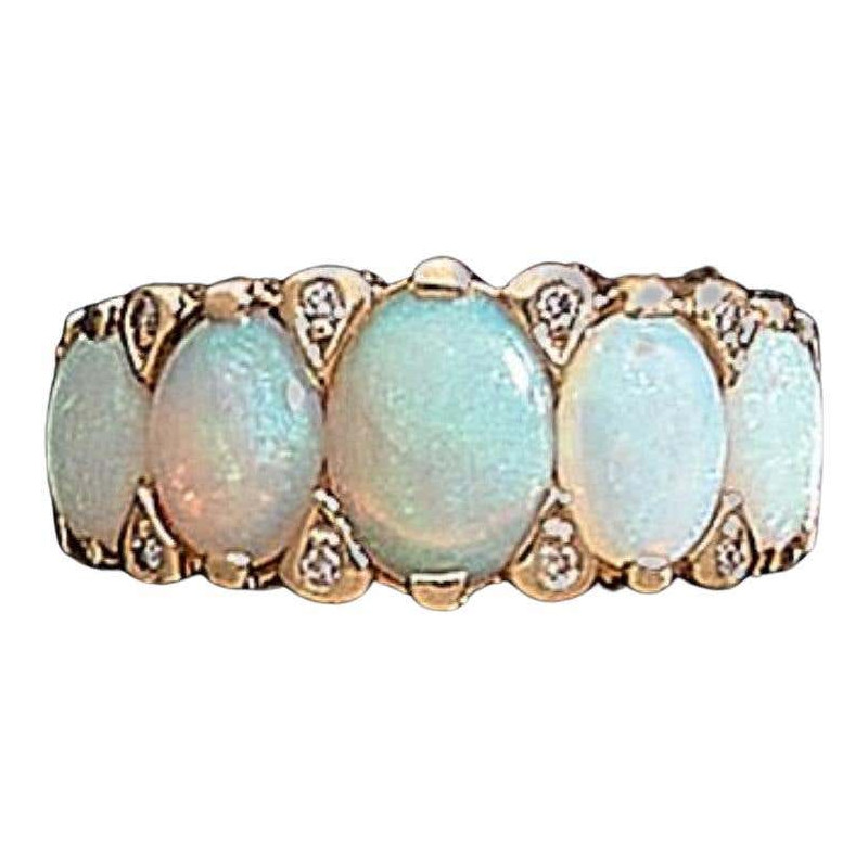 An Opal Diamond And Yellow Gold Ring
