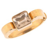 A Quartz And 18k Gold Hinged Bangle Bracelet