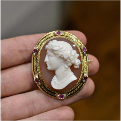 A Cameo Pearl Enamel Ruby And Yellow Gold Brooch