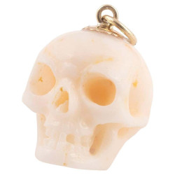 A Yellow Gold And White Coral Skull Pendant