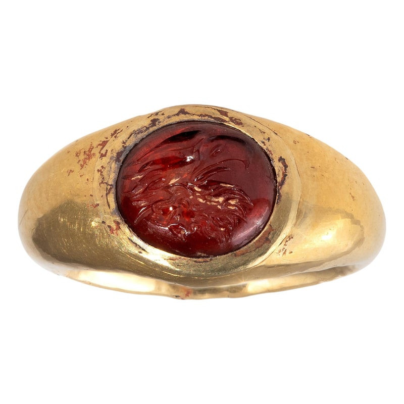 Roman Gold Ring with Garnet Intaglio of an Eagle's Head 1st century A.D.